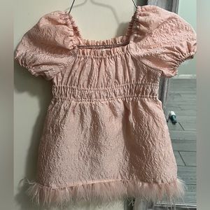 My toddler wore this dress once for a party.